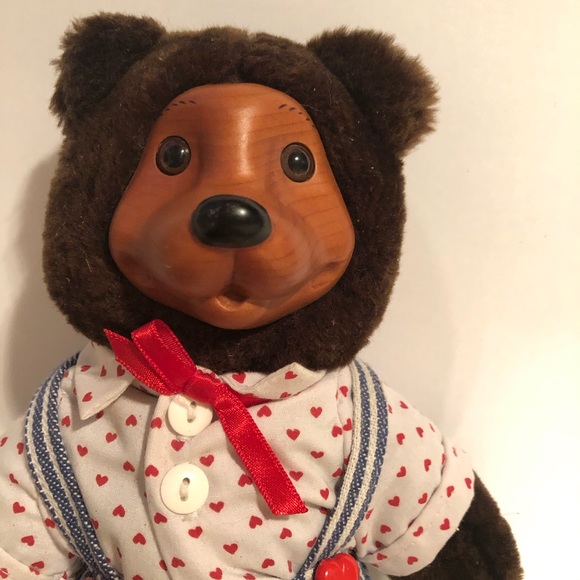 teddy bear with wooden face